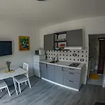 Апартаменты Deluxe And 